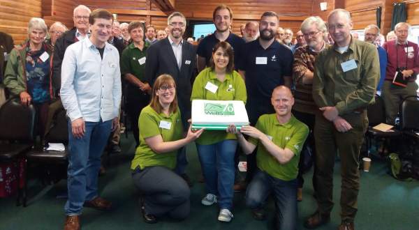 Cake and WeBS team and counters celebrating 70 years